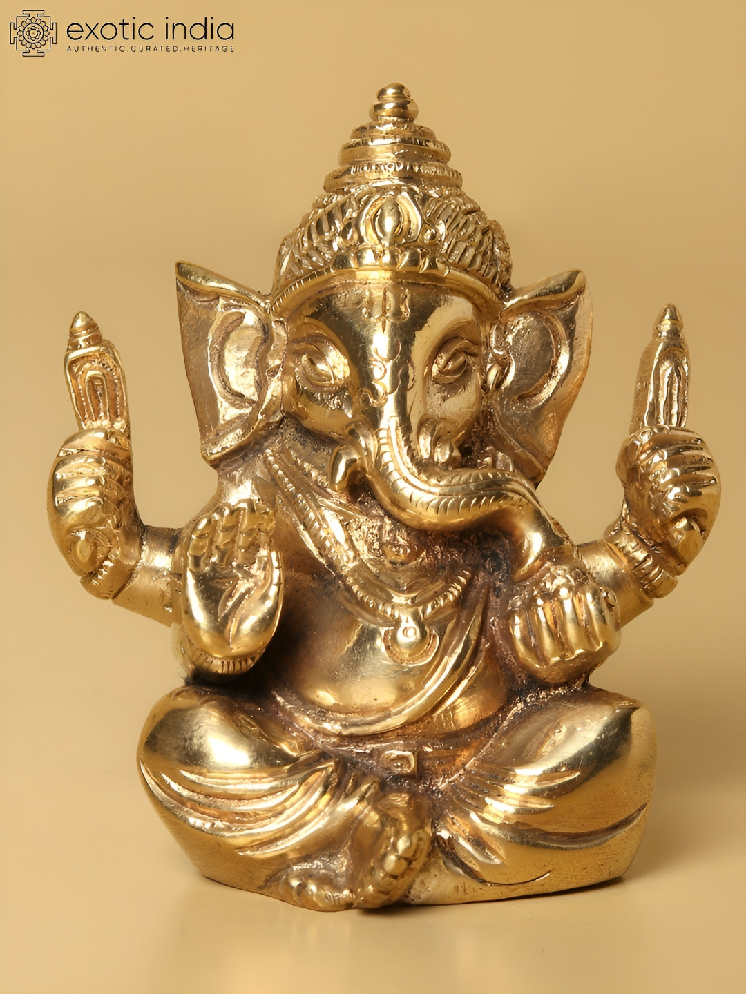 Exotic India Lord Ganesha in Ashirwad Mudra Gold Brass Metallic Prayer Room Tiny Showpiece - 1.7 Inches
