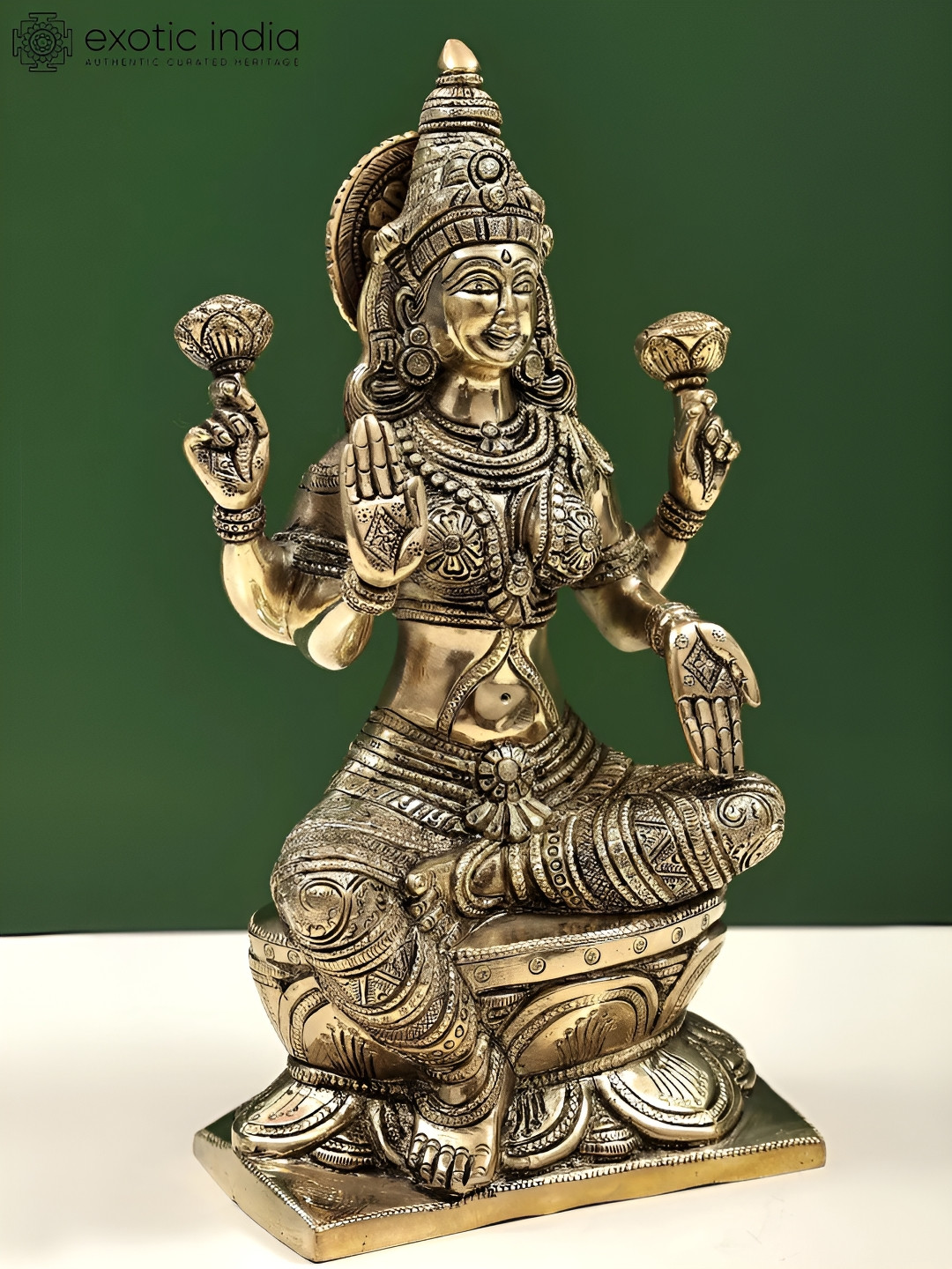 Exotic India Goddess Lakshmi Seated on Lotus Gold Brass Metallic Prayer Room Hand Made Medium Showpiece - 12 Inches