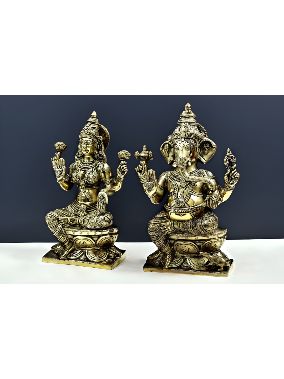 Exotic India Bhagawan Ganesha with Devi Lakshmi Gold Brass Metallic Prayer Room Hand Made Set of 2 Large Showpieces - 3.5 Inches