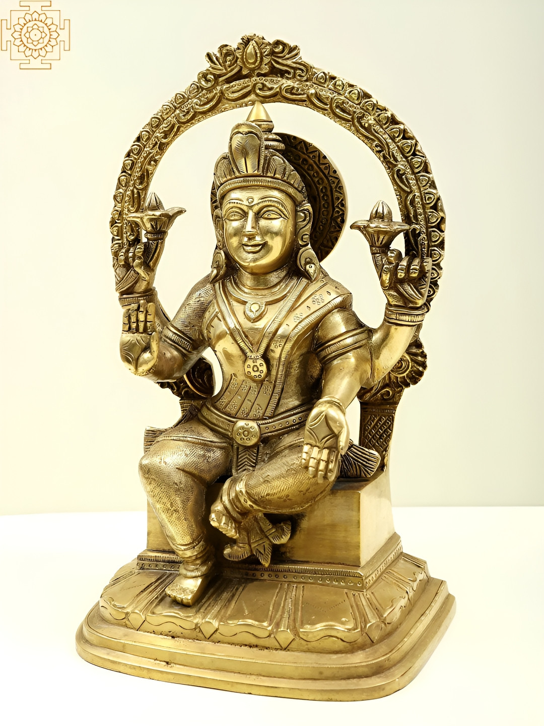 Exotic India Goddess Lakshmi Seated On Pedestal Gold Brass Metallic Prayer Room Medium Showpiece - 10 Inches