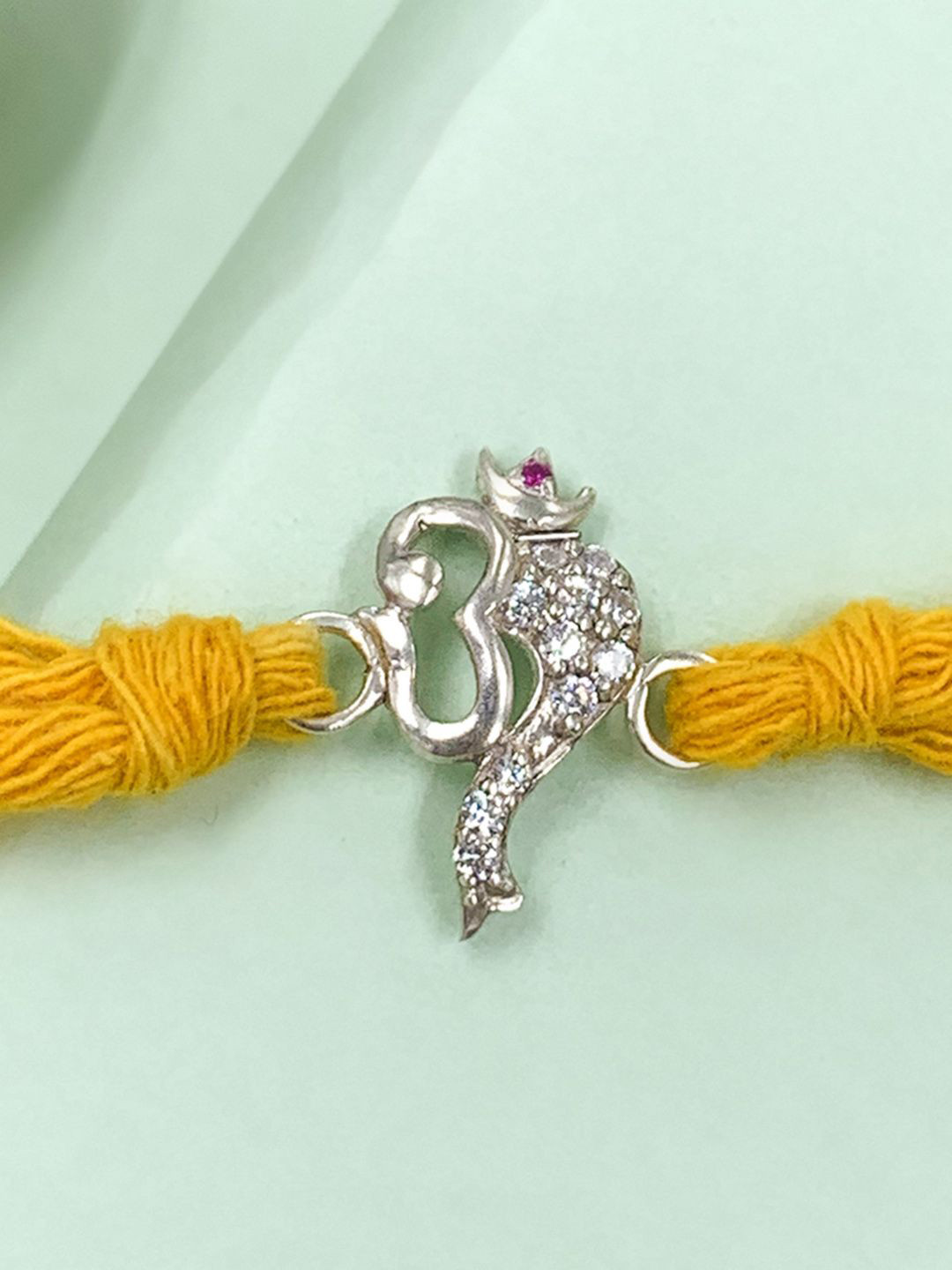 Unniyarcha Pure 92.5 Om and Ganesha Silver Thread Rakhi