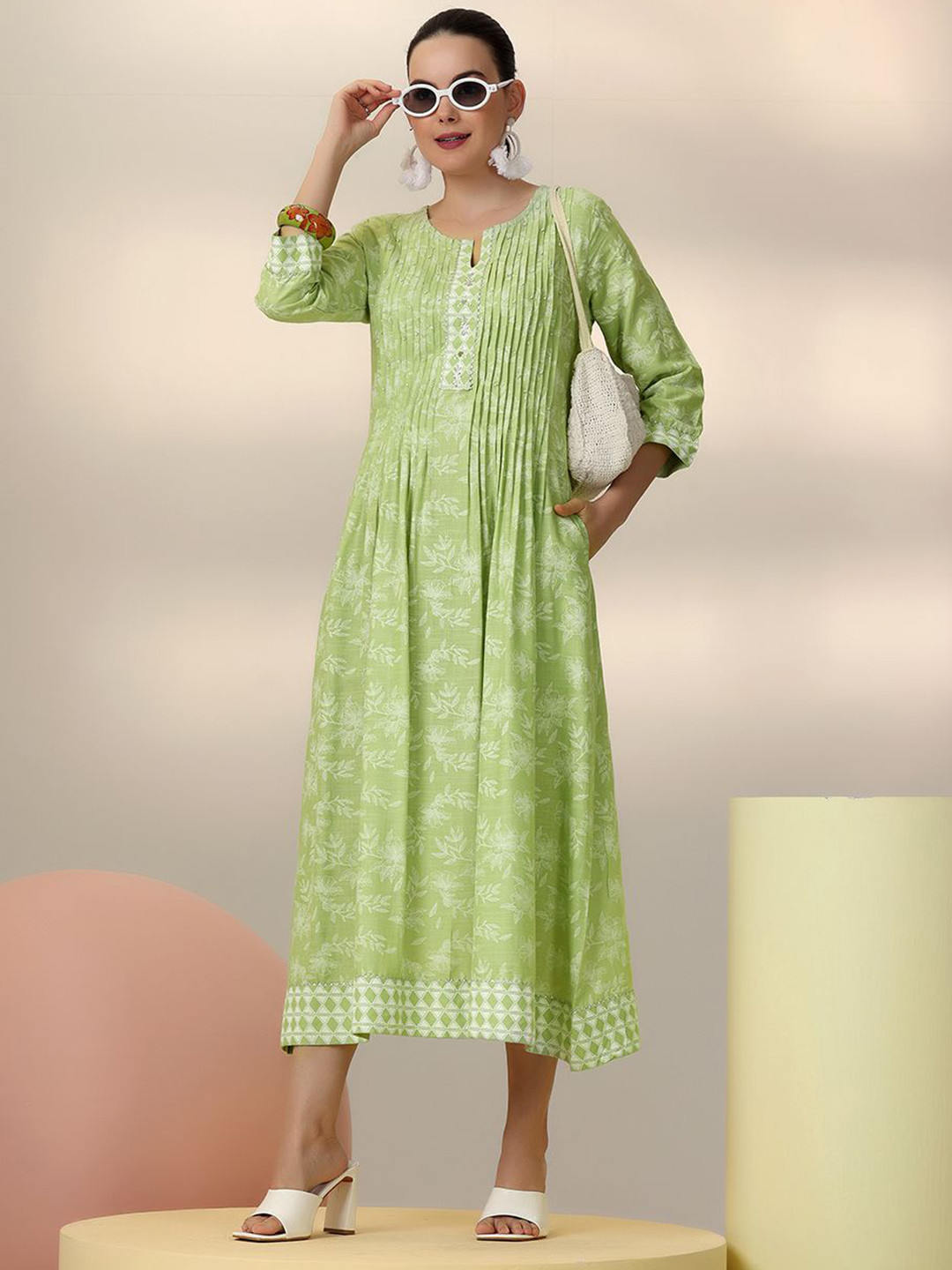 Libas Floral Printed A-Line Midi Dress with a pleated style