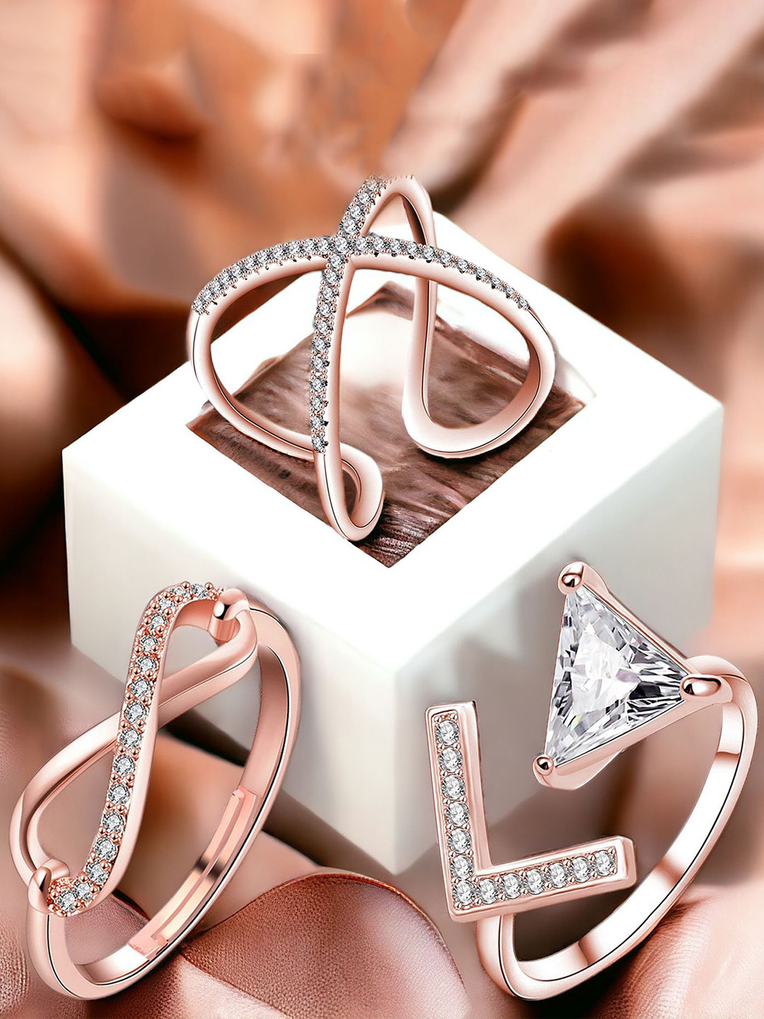 Okos Set Of 3 Rose Gold-Plated Cubic Zirconia Stone-Studded Finger Rings