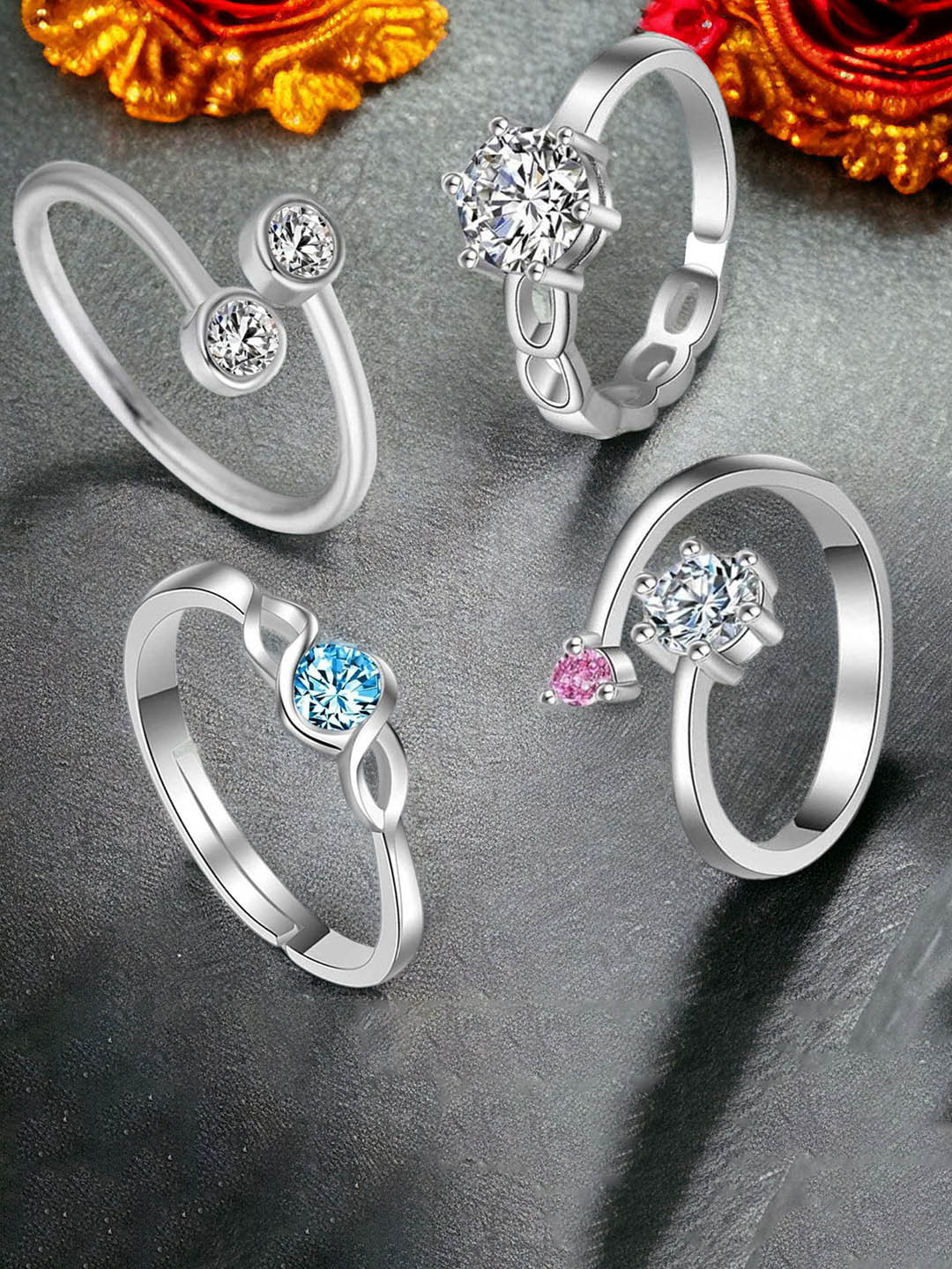 Okos Set Of 4 Rhodium-Plated Cubic Zirconia-Studded Charismatic Solitaire Finger Rings