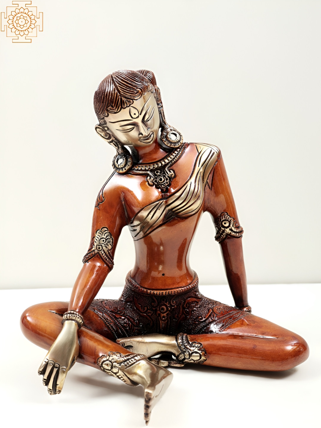 Exotic India Tibetan Buddhist Deity Green Tara Orange Brass Metallic Living Room Hand Made Medium Showpiece - 8.3 Inches