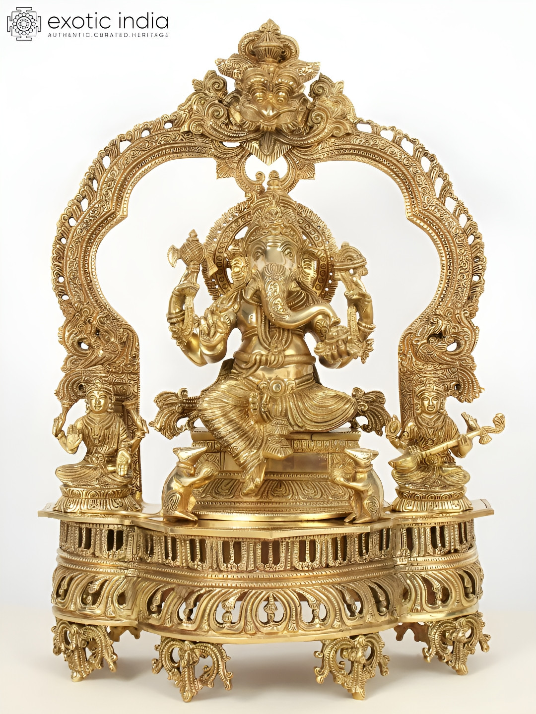 Exotic India Lord Ganapati Seated On Kirtimukha Throne with Lakshmi and Saraswati Gold Brass Metallic Prayer Room Large Showpiece - 22 Inches