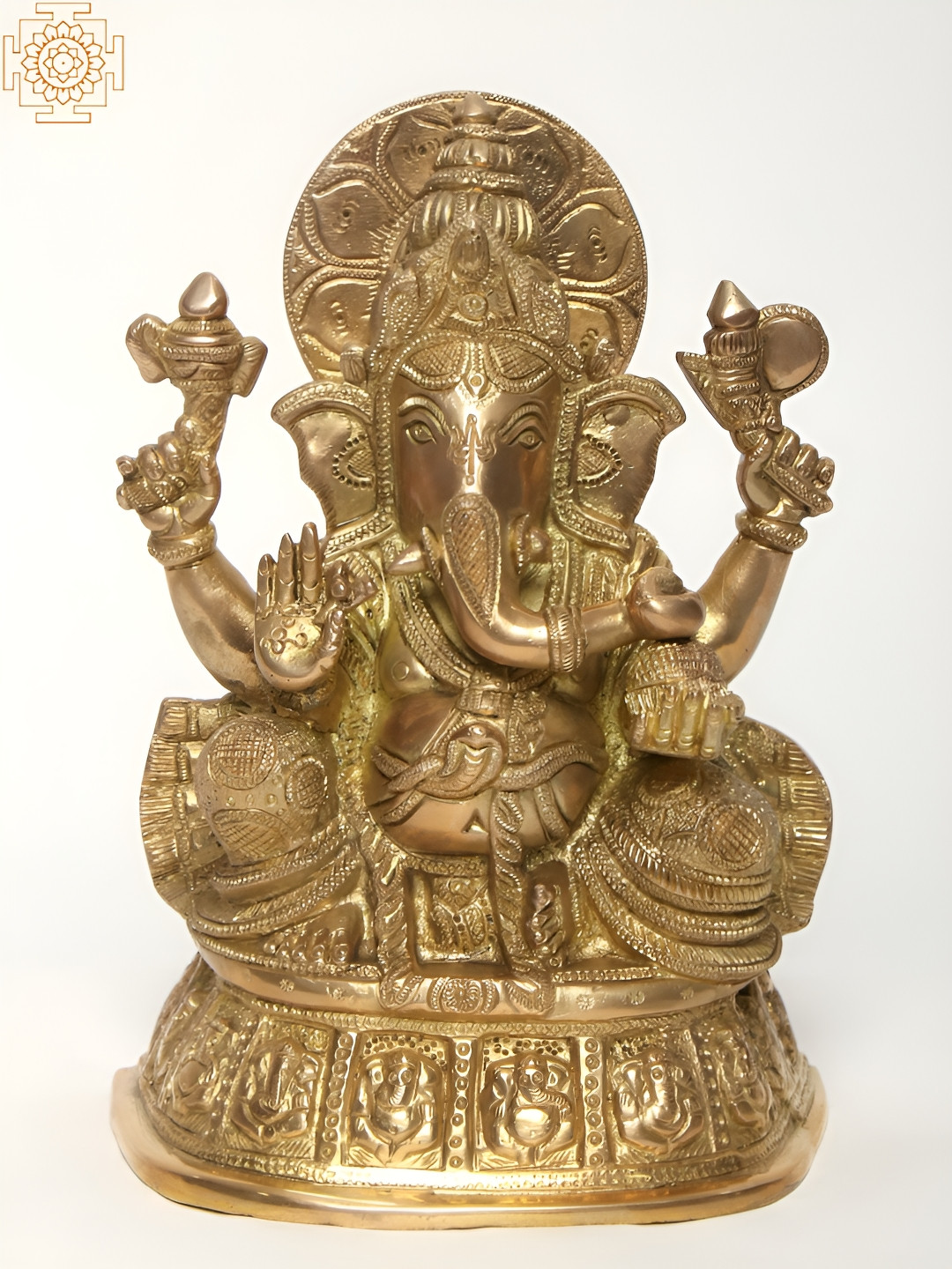 Exotic India Chaturbhuja Lord Ganesha Seated on Pedestal Gold Brass Metallic Prayer Room Medium Showpiece - 9.5 Inches