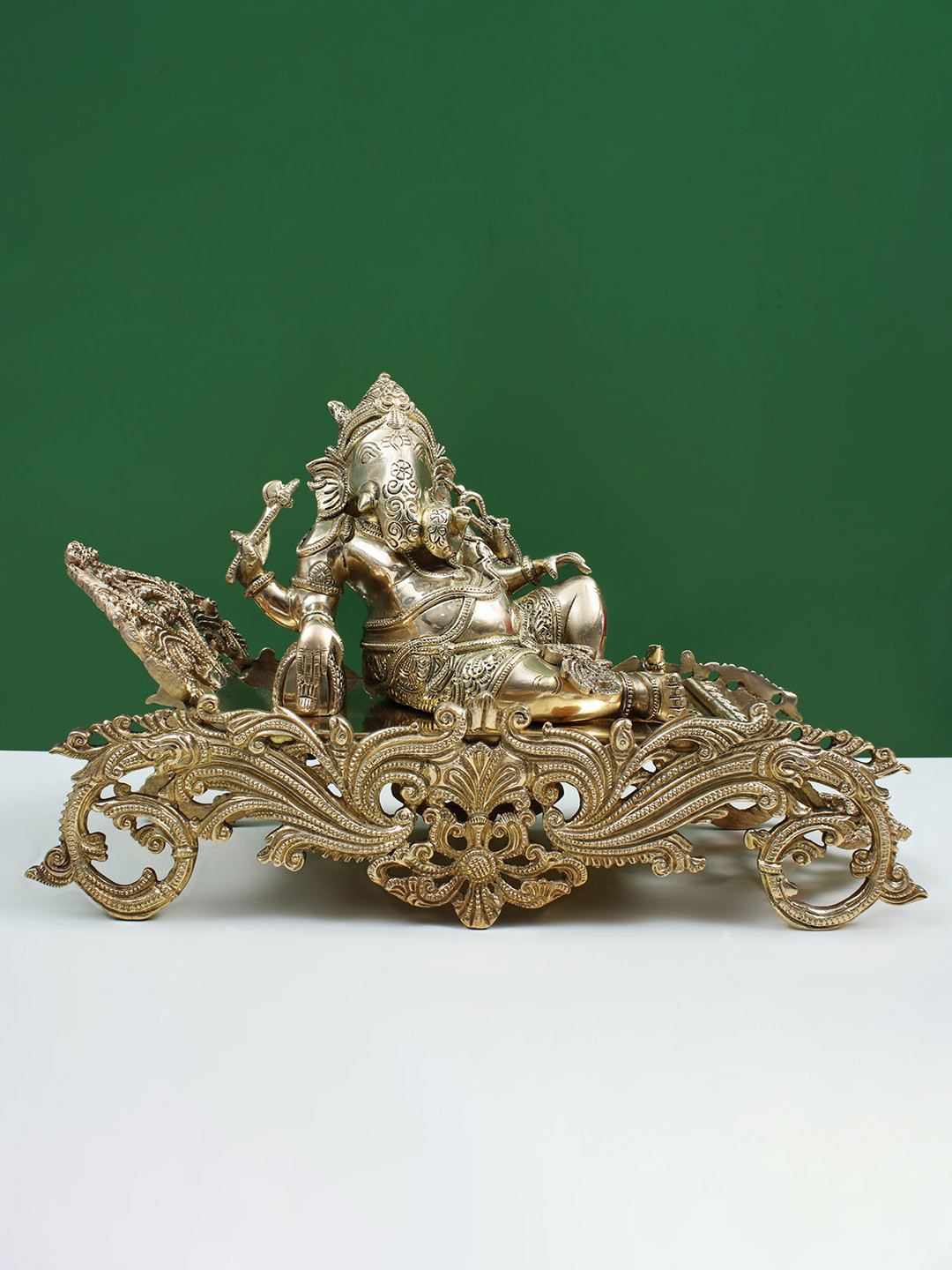 Exotic India Relaxing Ganesha Gold Brass Metallic Prayer Room Medium Showpiece - 8.7 Inches