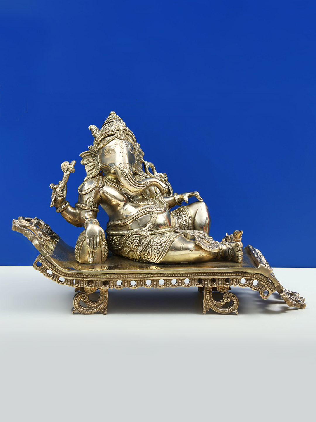 Exotic India Relaxing Ganesha Gold Brass Metallic Prayer Room Medium Showpiece -