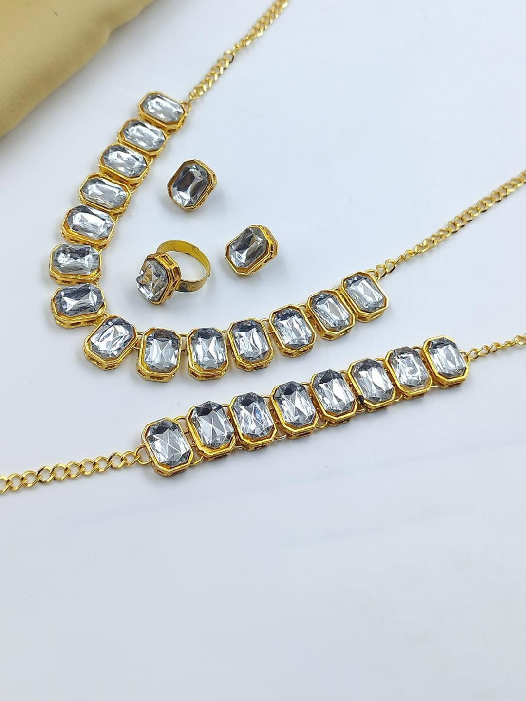 Gyaan Jewels Gold-Plated Stone-Studded Necklace and Earrings With Bracelet Finger Ring