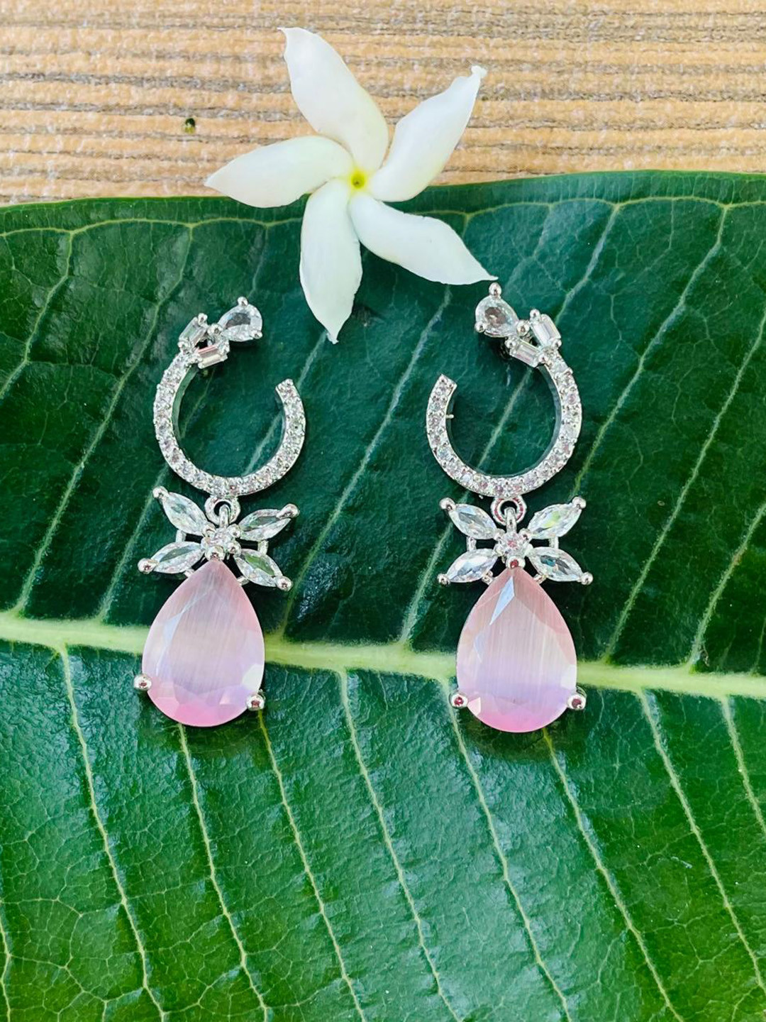 MONI LIFESTYLE American Diamond Studded Teardrop Shaped Drop Earrings