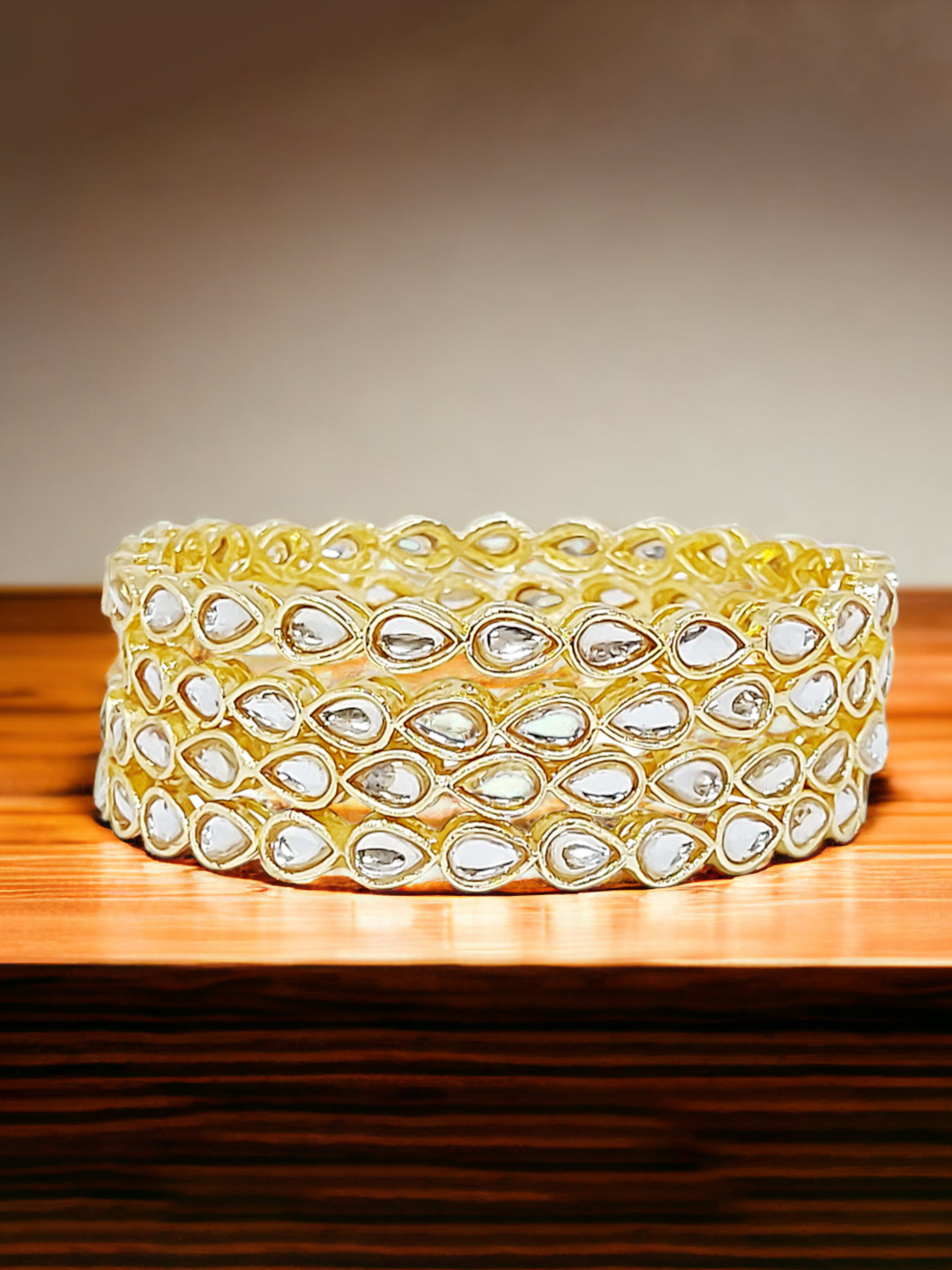 CHRISHAN Set Of 4 Gold-Plated Stones-Studded Bangles