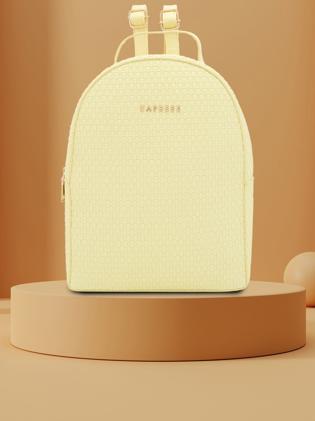 Caprese Riva Women Yellow Medium Backpack