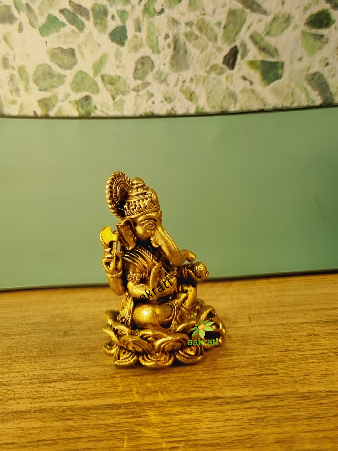 Aakrati Ganesh Yellow Brass Metallic Prayer Room Tiny Showpiece - 1.6 Inches