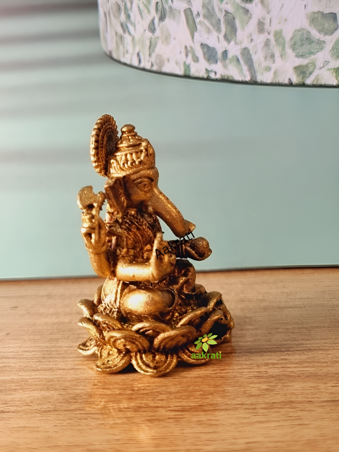 Aakrati Ganesh Yellow Brass Metallic Prayer Room Tiny Showpiece - 1.4 Inches