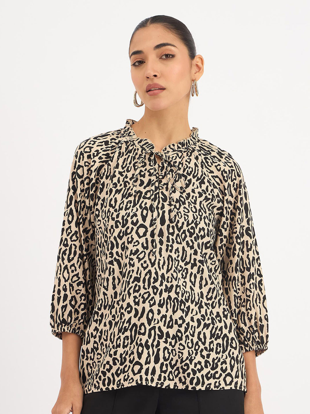 SALT ATTIRE Animal Print Tie-Up Neck Top