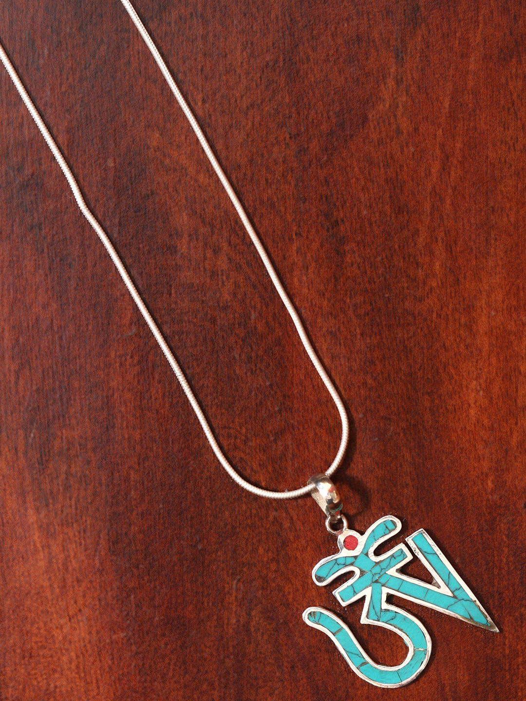 Exotic India Turquoise Colored Tibetan Om (AUM) Inlay Pendant