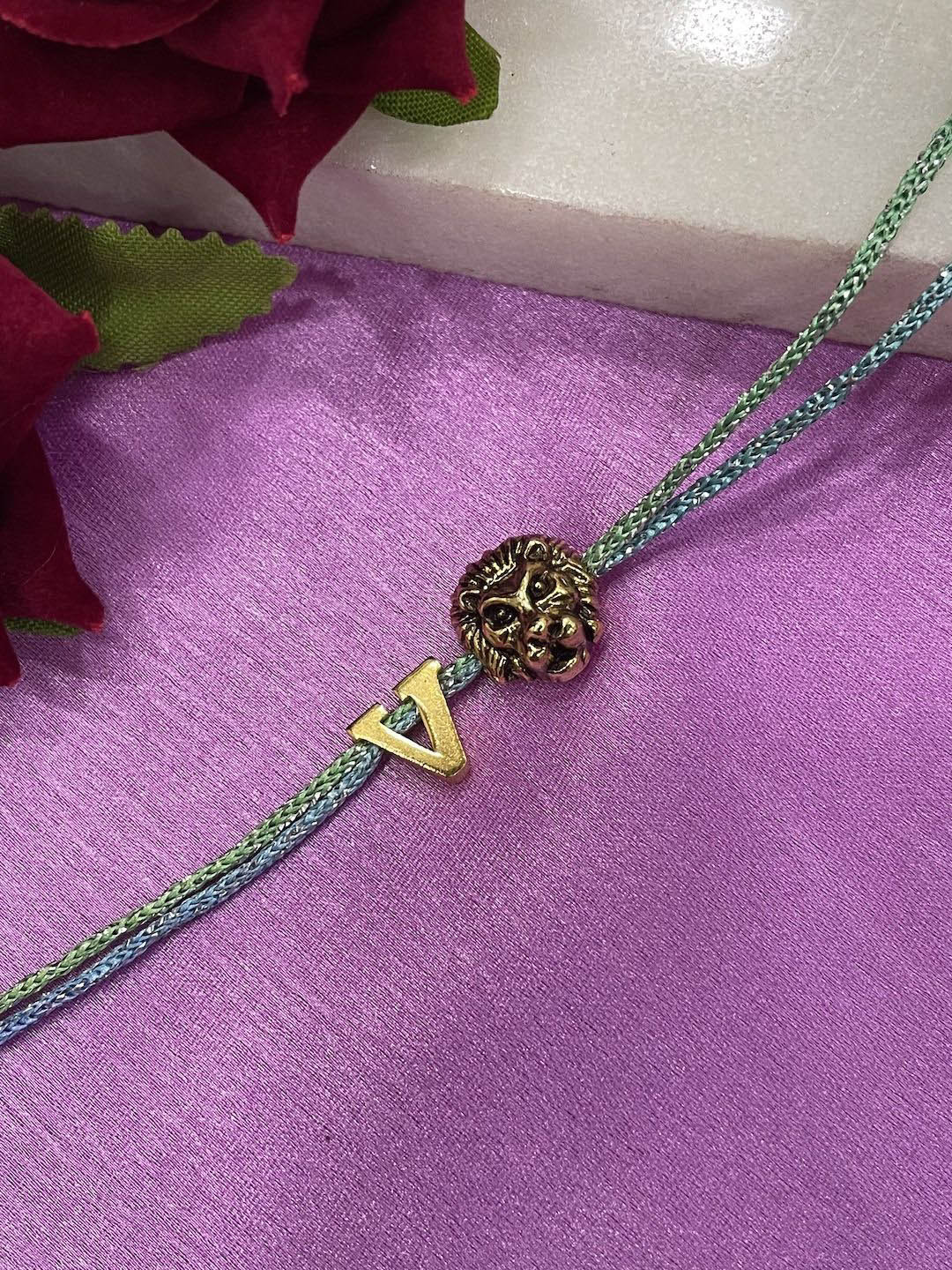 Digital Dress Room V Initial Lion Charm Thread Rakhi