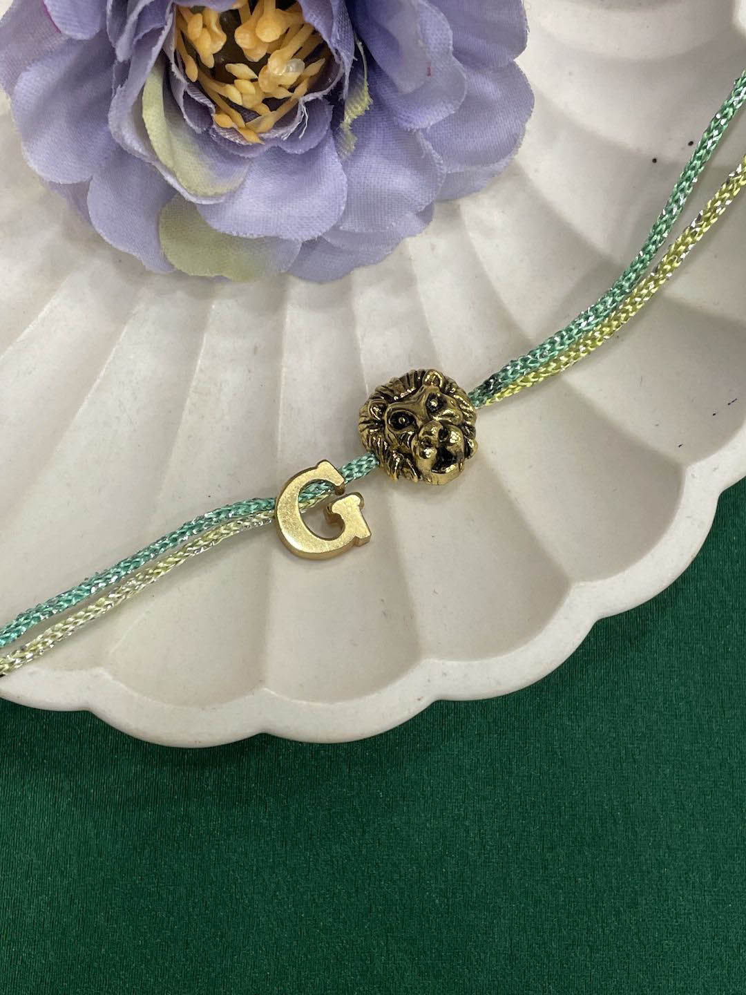 Digital Dress Room Letter G Lion Charm Thread Rakhi