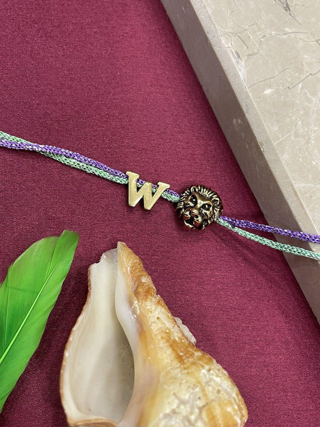 Digital Dress Room W Initial Lion Charm Thread Rakhi