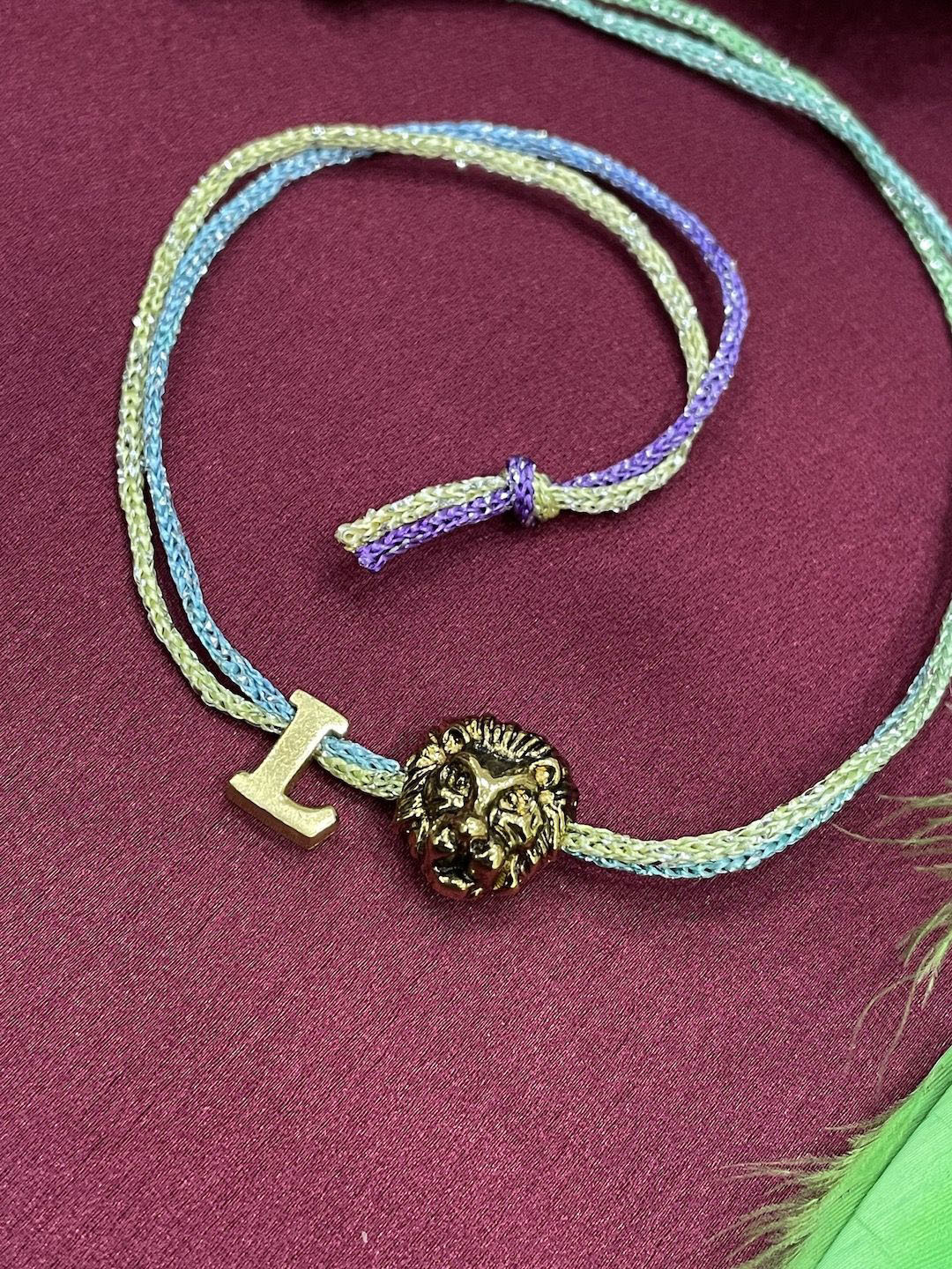 Digital Dress Room L Initial Lion Charm Thread Rakhi