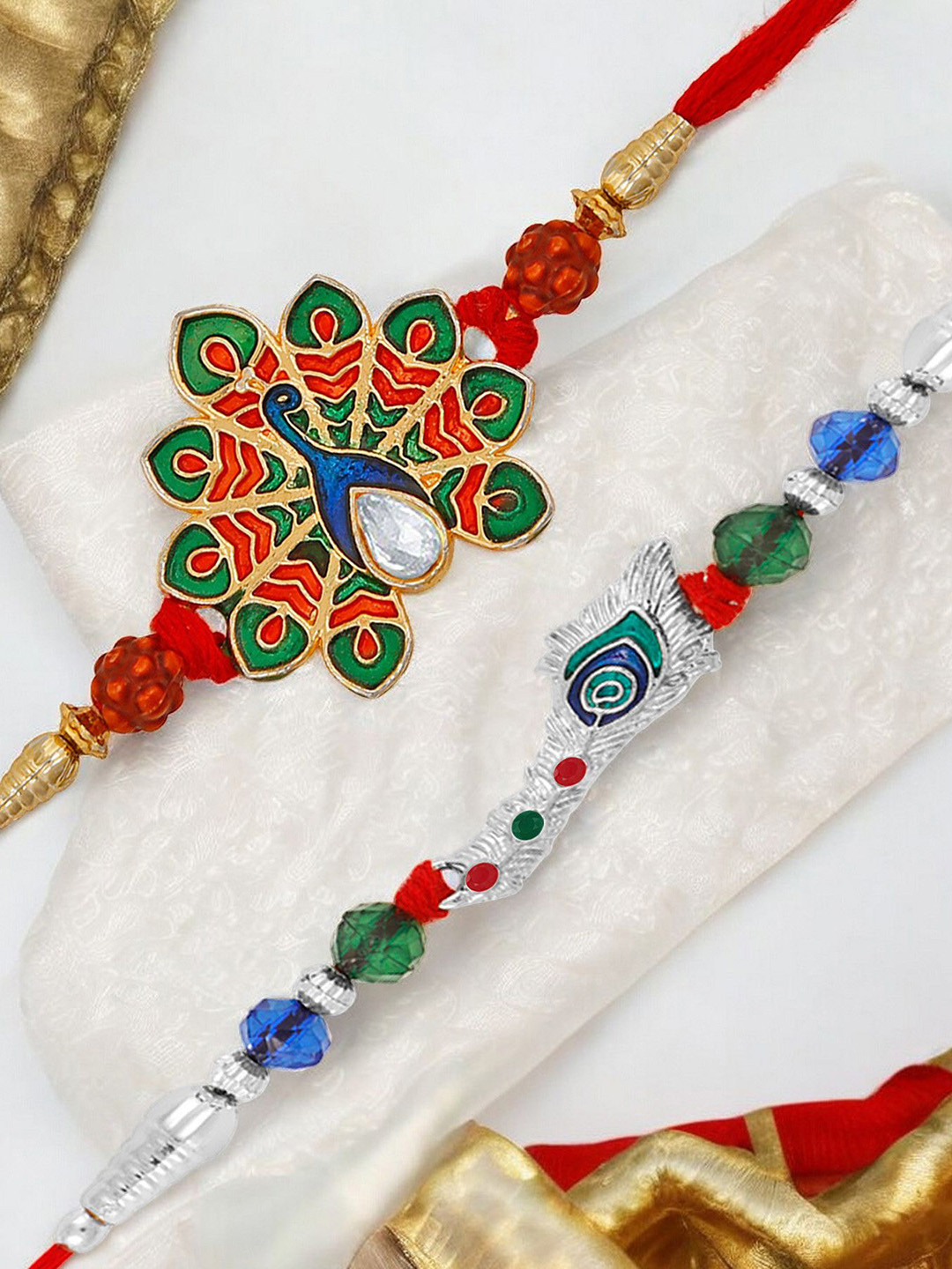 Okos Set Of 2 Gold and Rhodium Plated Dancing Peacock and Feather Style Thread Rakhis