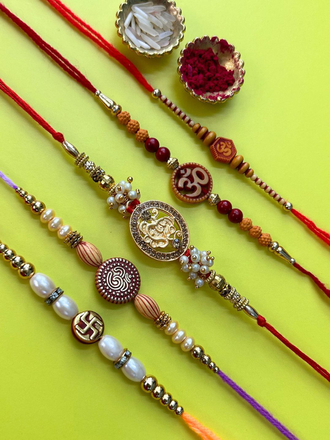 LAIDA Set Of 5 Swastik & Om AD Studded & Beaded Thread Rakhis With Roli Chawal