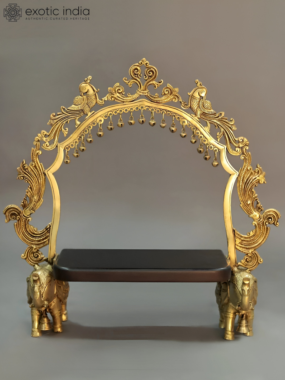 Exotic India Kirtimukha Prabhavali on Elephants Stand Gold Brass Metallic Prayer Room Hand Made Large Showpiece - 8.5 Inches