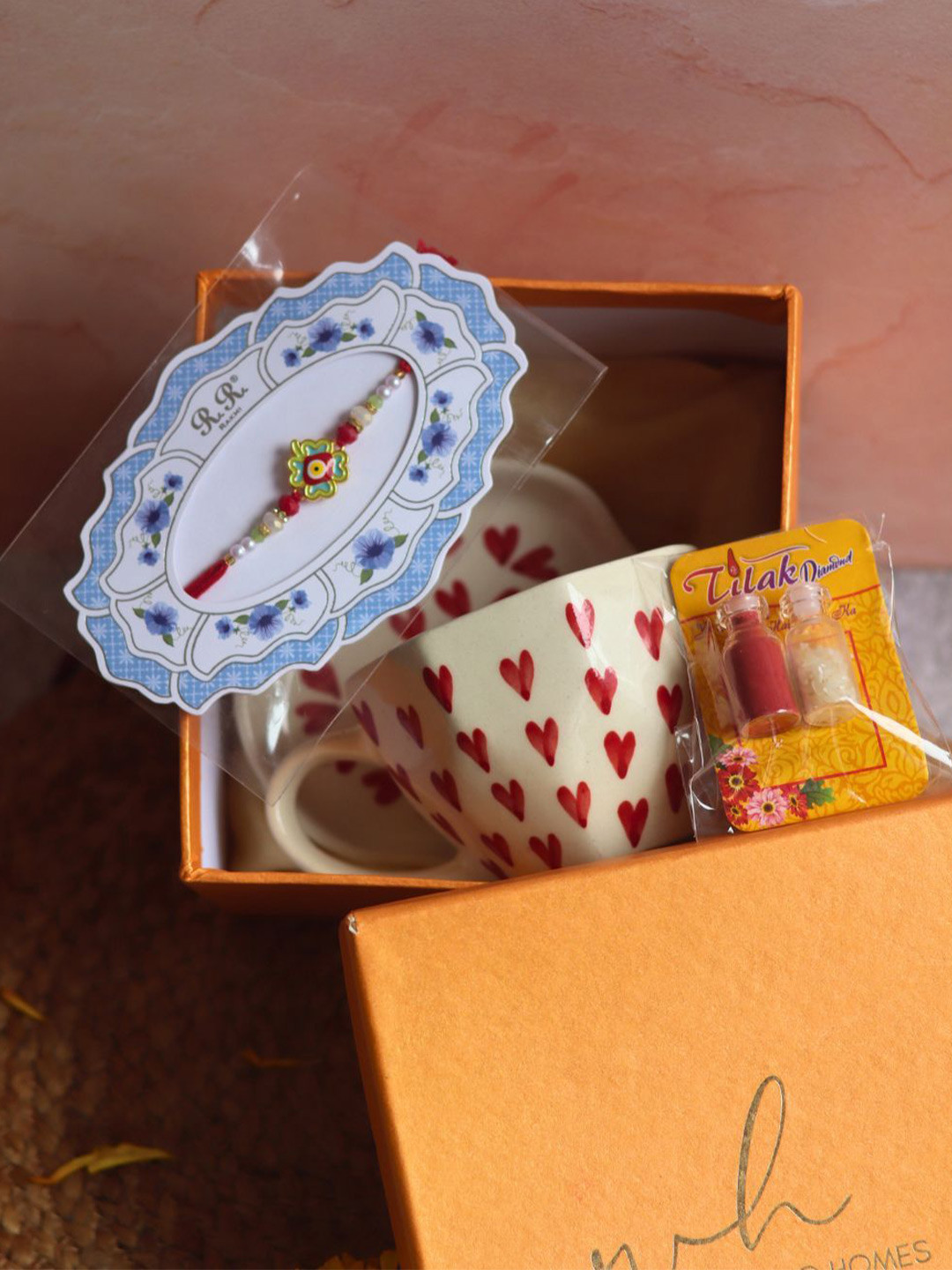 WEAVING HOMES Set Of 3 Rakhi with Heart Mug & All Heart Dessert Plate
