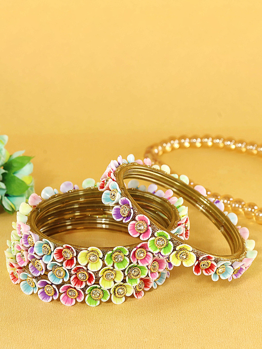 ZULKA Set Of 4 Stone-Studded Flower Bangles