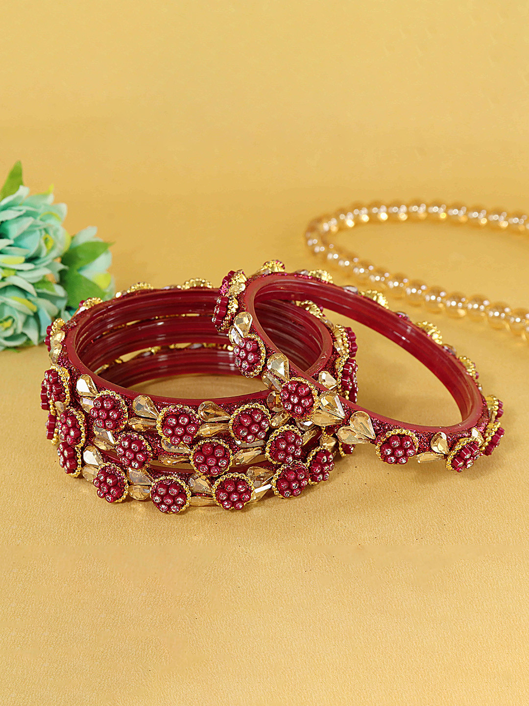 ZULKA Set Of 4 CZ Stone Studded Bangles