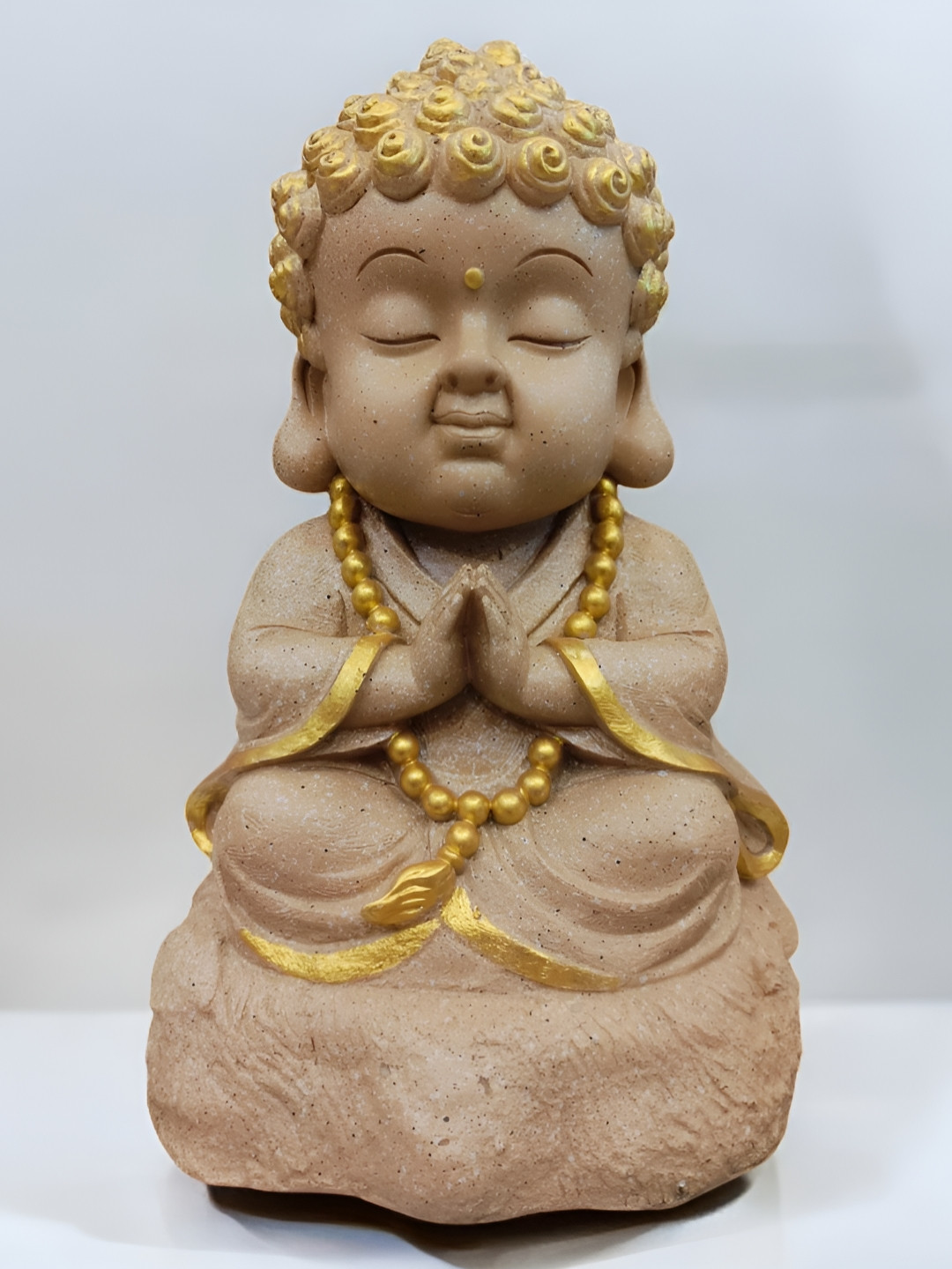 SANKALAN CREATIONS Beautiful Smiling Monk Brown Polyresin Matte Living Room Lights Medium Showpiece -