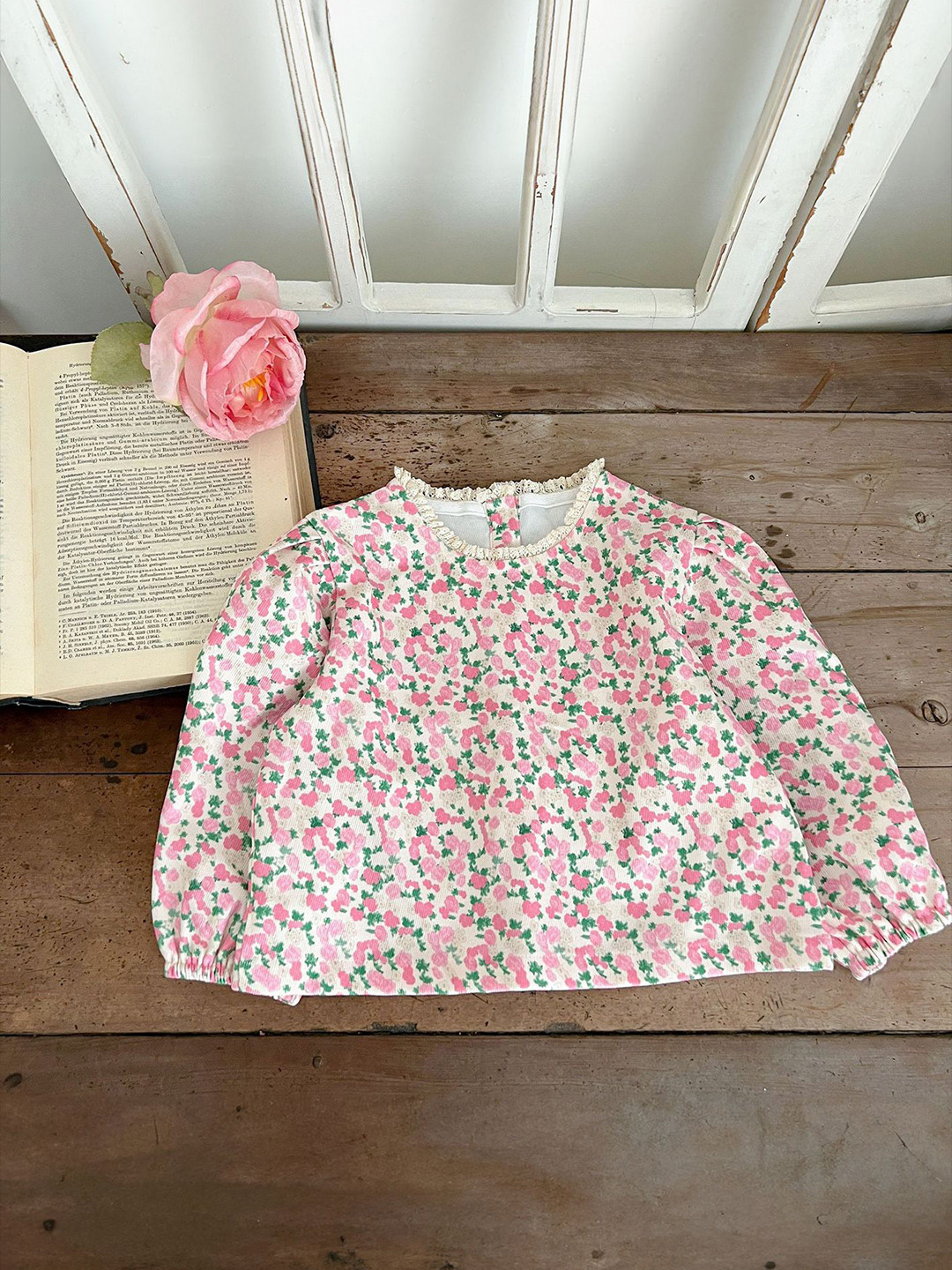 LULU & SKY Floral Print Styled Back Crop Top