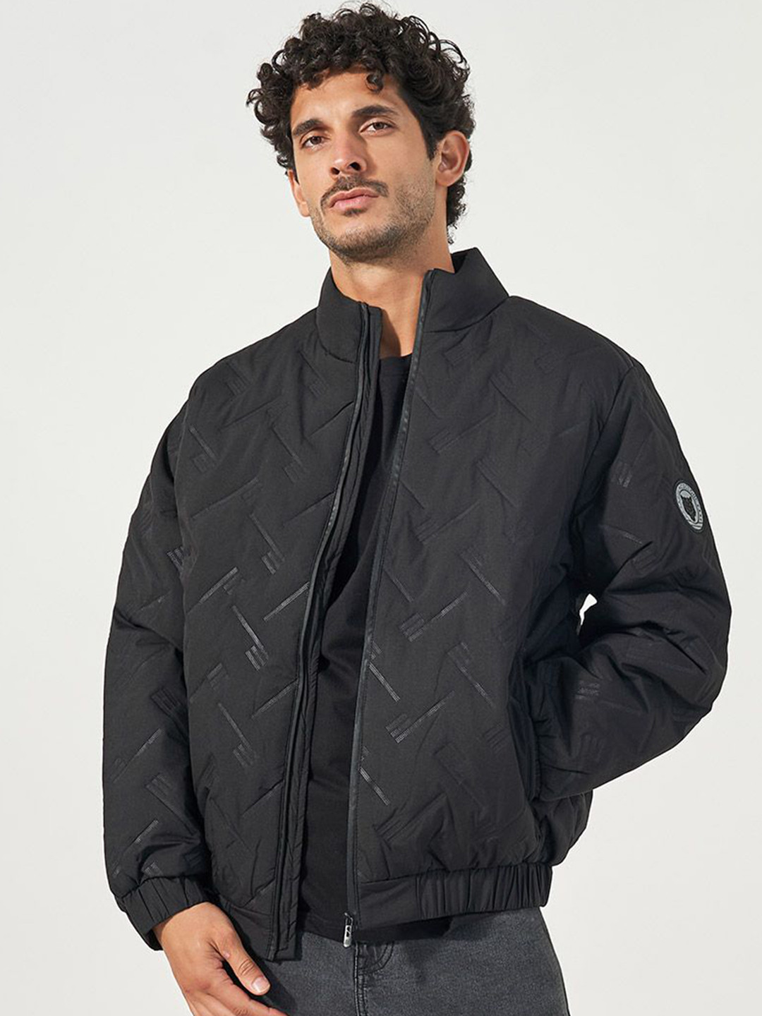 Styli Men High Neck Chevron Quilted Puffer Jacket with Badge