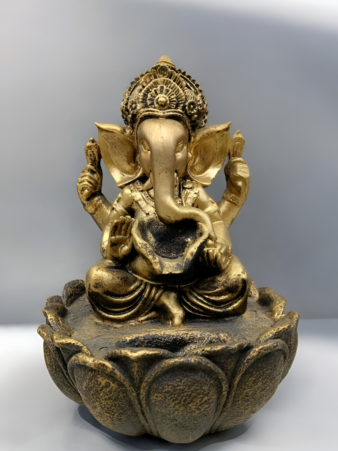 Vrinban International Ganesha Gold Polyresin Glossy Prayer Room Medium Showpiece -