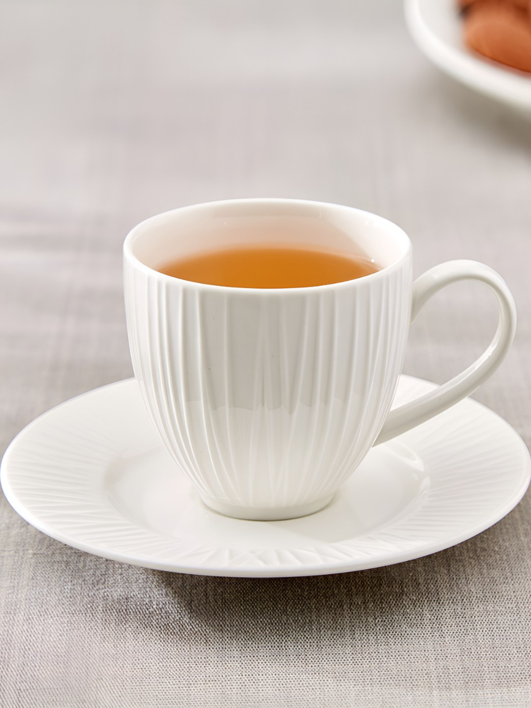 Home Centre Marshmallow brook White Textured Porcelain Glossy Cup and Saucer - 180ml