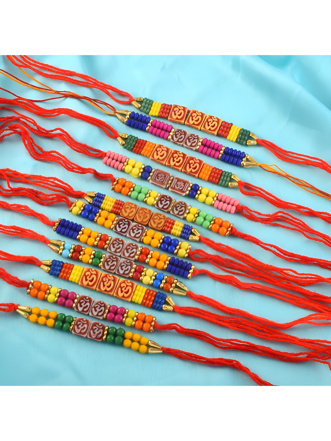MEMOIR Red and Blue 12 Pieces Kaleva Moli Thread Beaded Rakhis