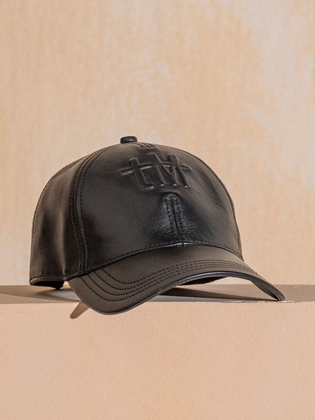 the Misnomer Unisex Leather Baseball Cap