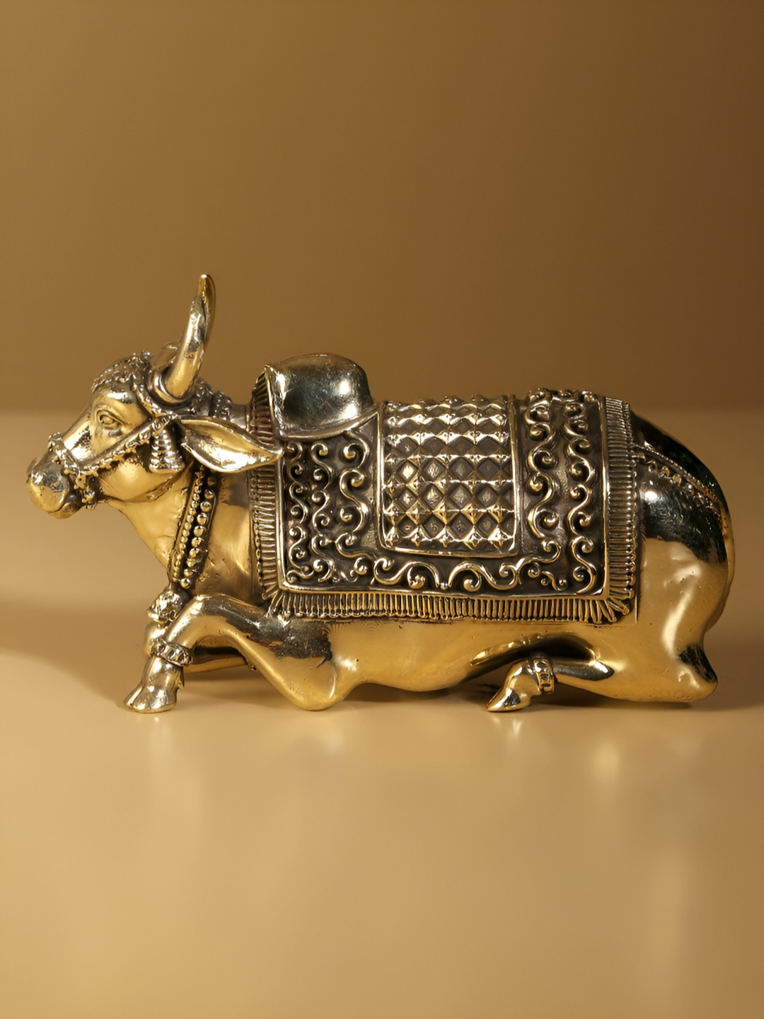 Exotic India Superfine Nandi Gold Brass Metallic Prayer Room Small Showpiece - 2.5 Inches
