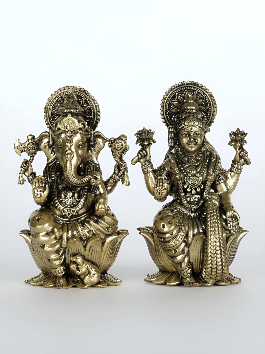 Exotic India Superfine Pair Of Ganesha Lakshmi Gold Brass Metallic Prayer Room Set of 2 Small Showpieces - 1.2 Inches