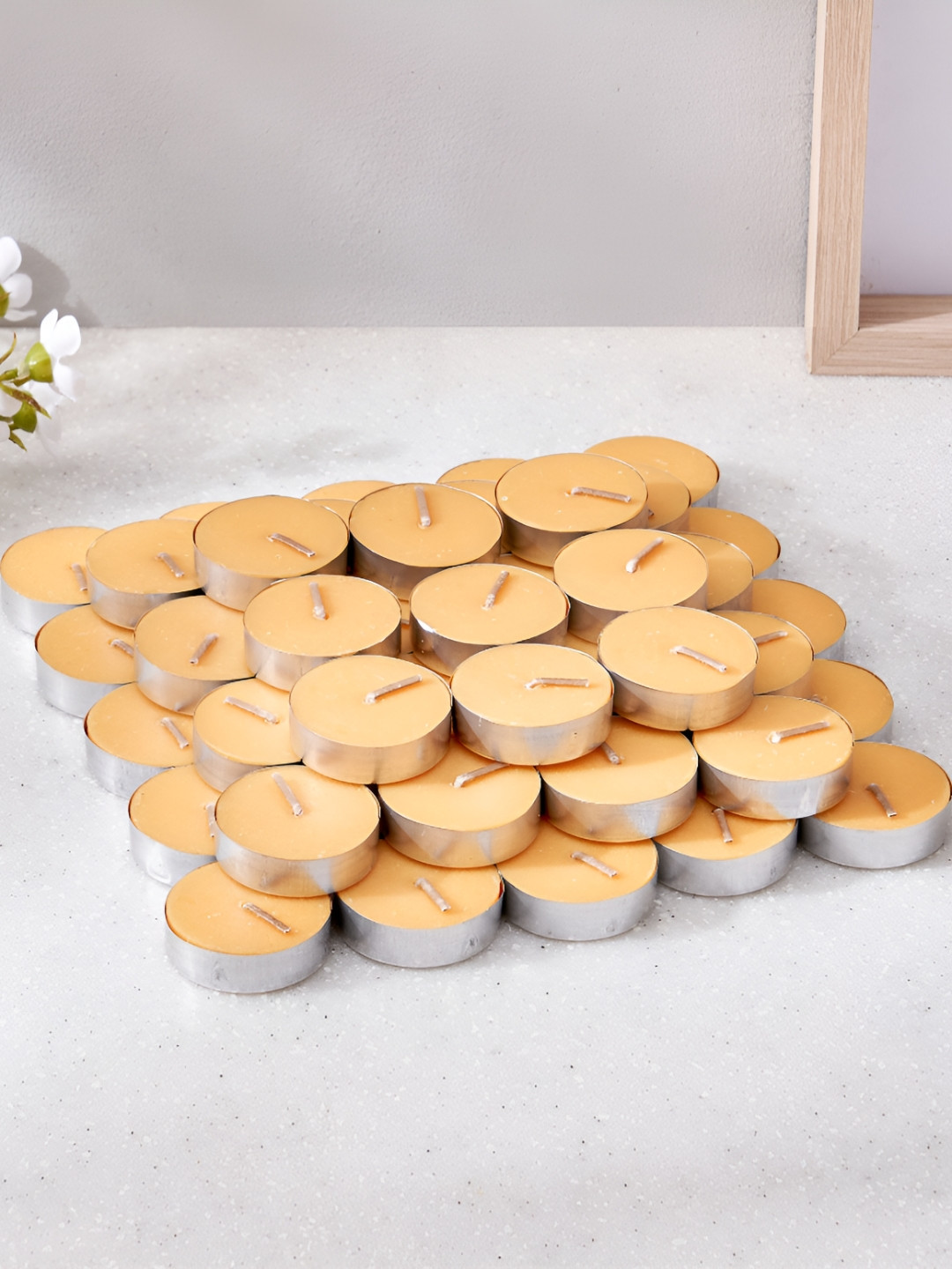Home Centre Luminescent 50Pcs 1 Wick Citrus Burst Solid Round Regular Tea Light Candles