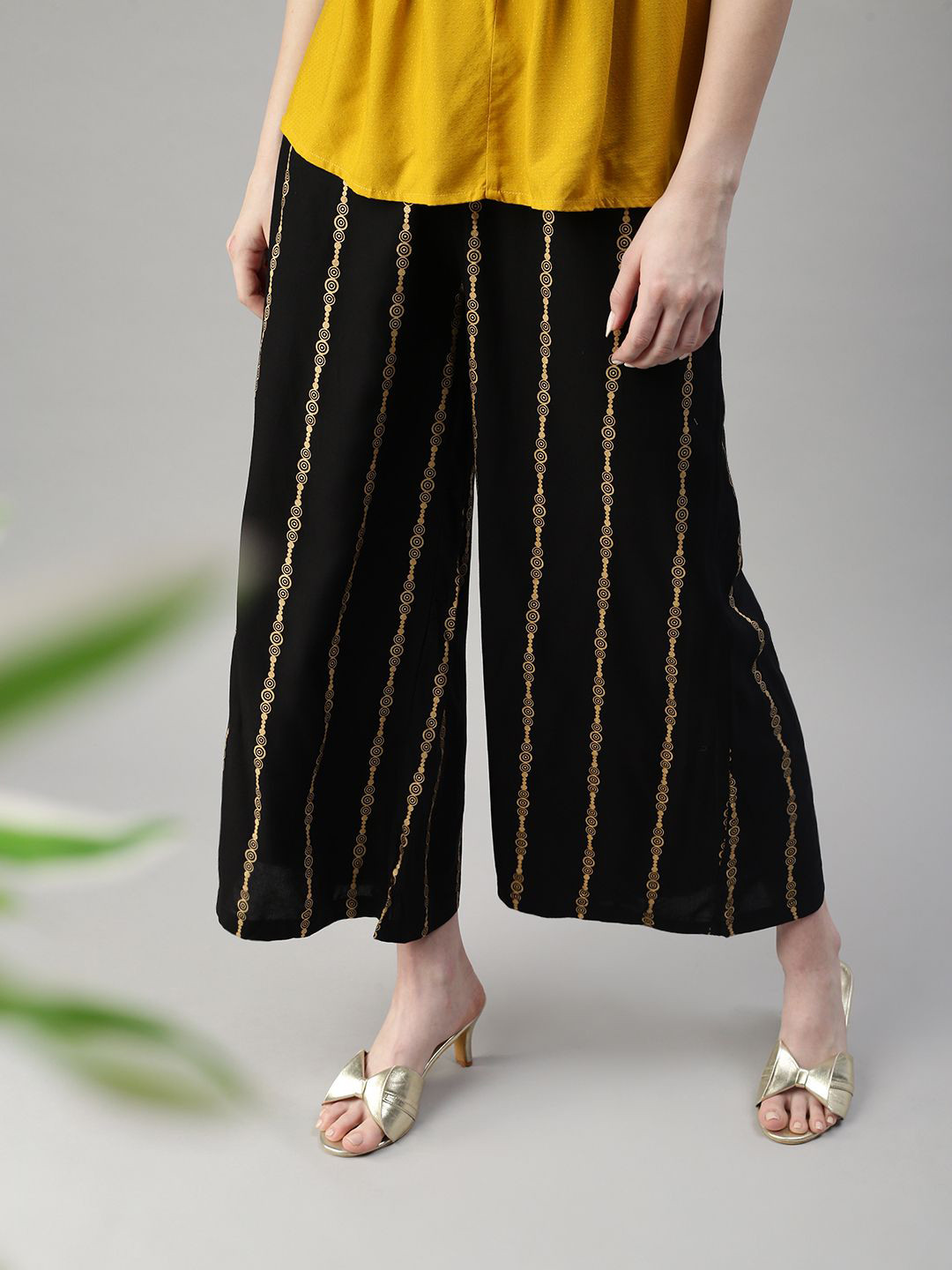 Kryptic Women Black Striped Flared Ethnic Slip-On Palazzos