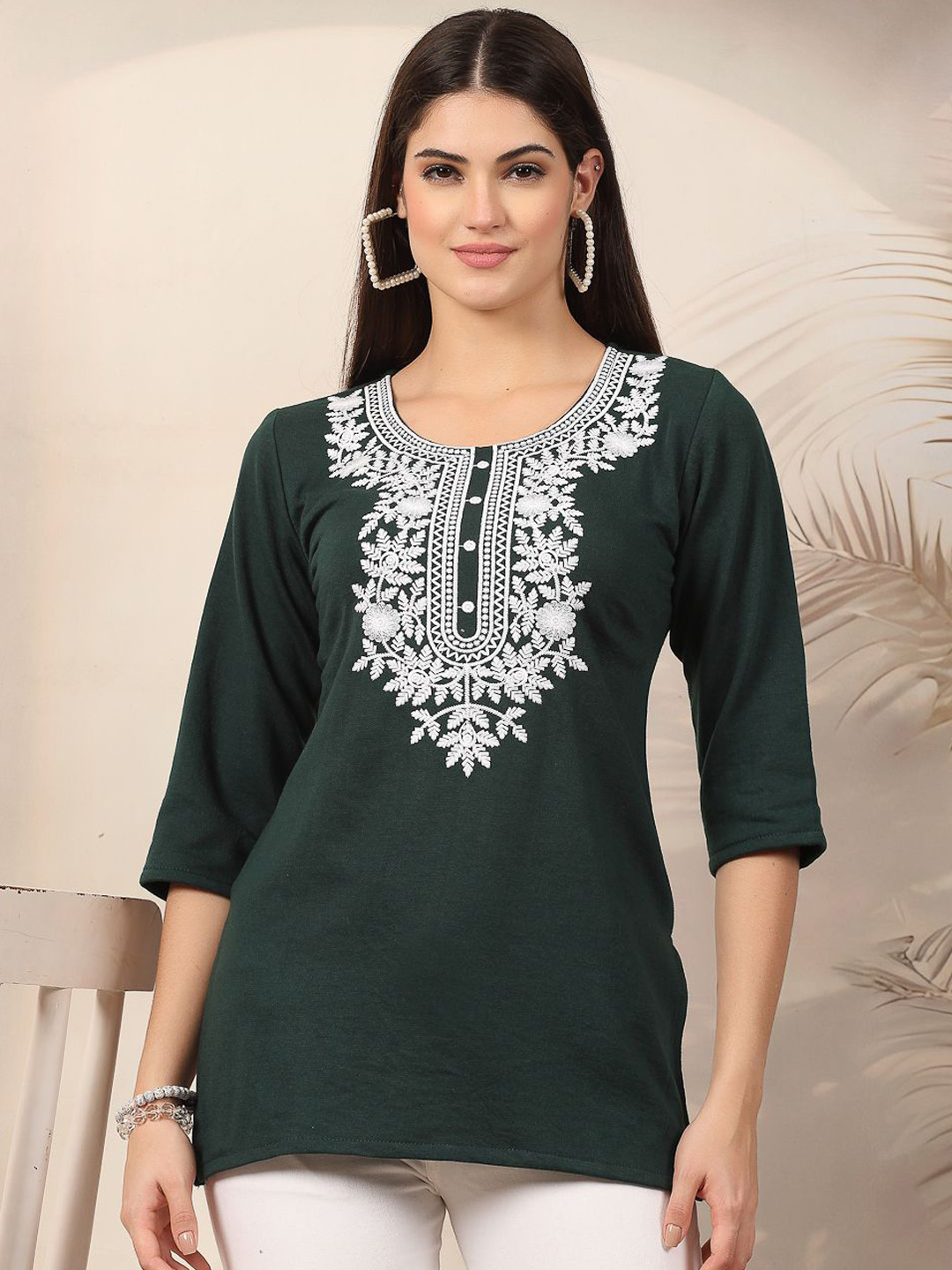 Clora Creation Floral Embroidered Woollen Straight Kurti