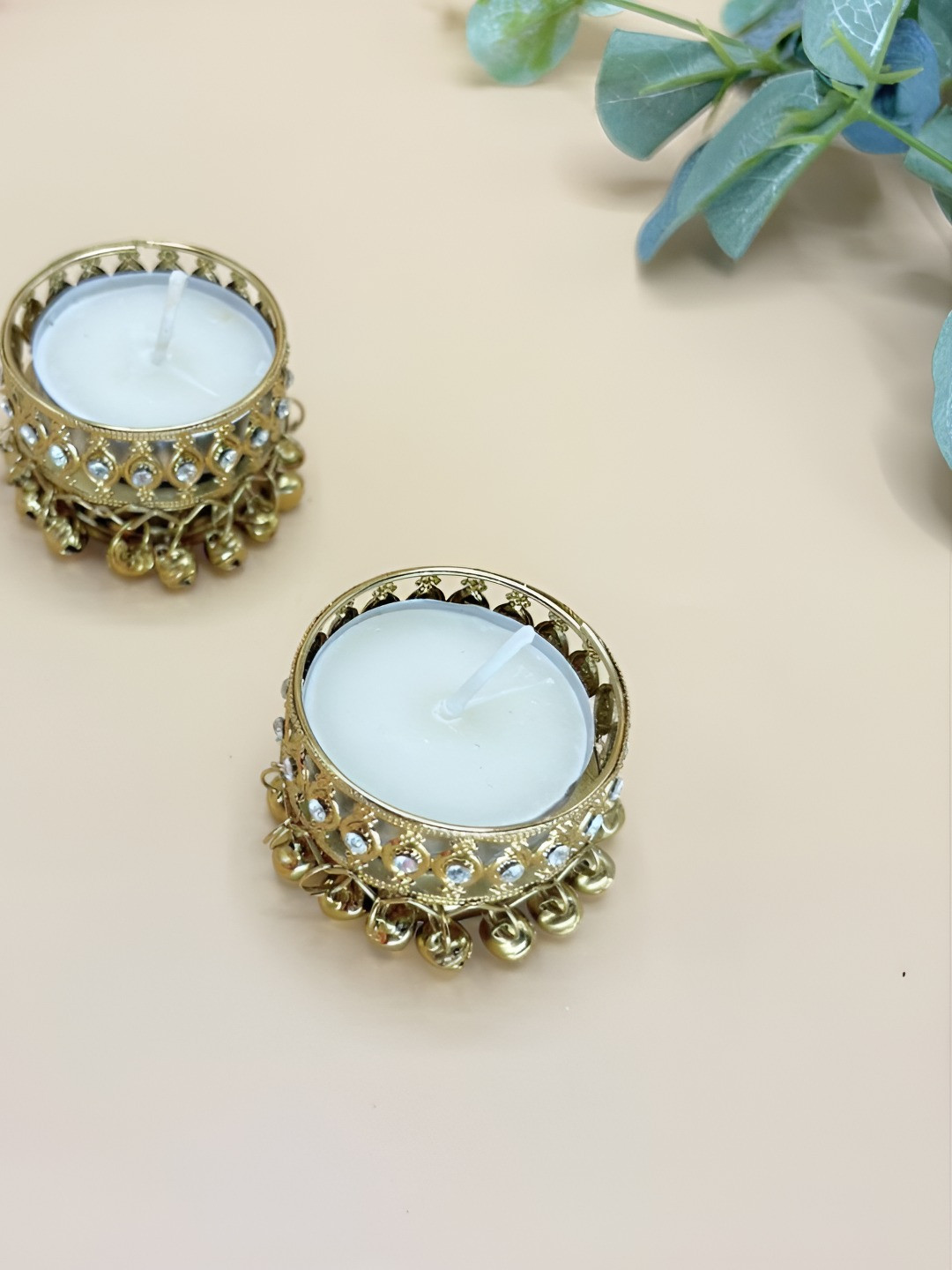 THE HOME CO. Gold-Toned & White 2 Pieces Self Design Ghungroo Tea Light Candle Holder
