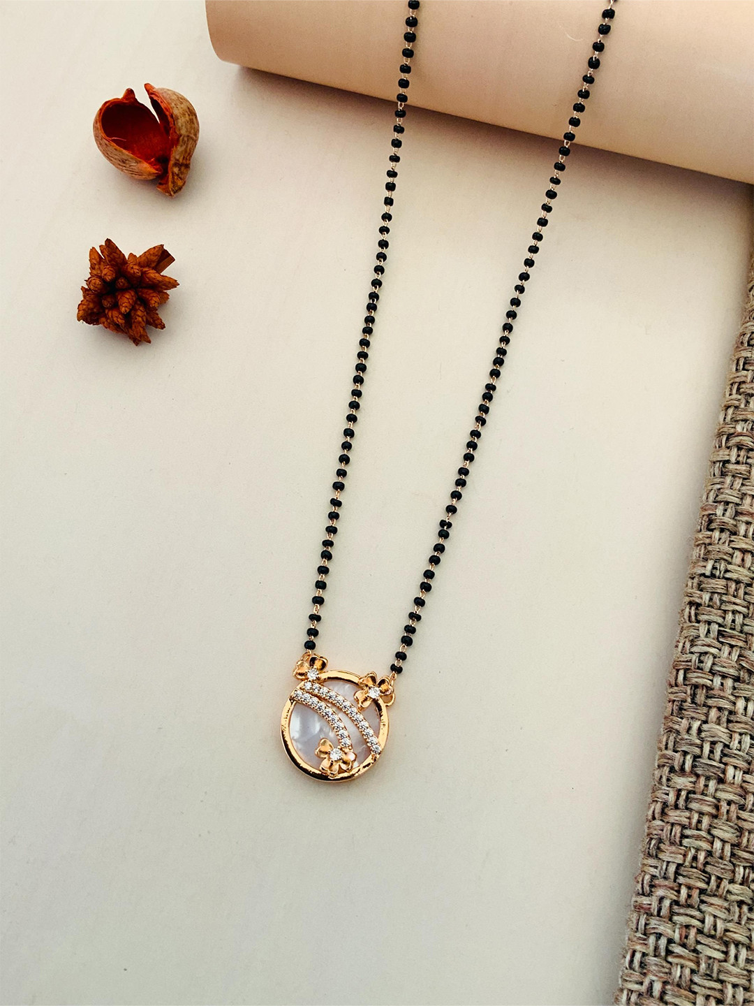 ABDESIGNS Rose Gold-Plated AD Stone Studded & Mother Pearl Beaded Mangalsutra