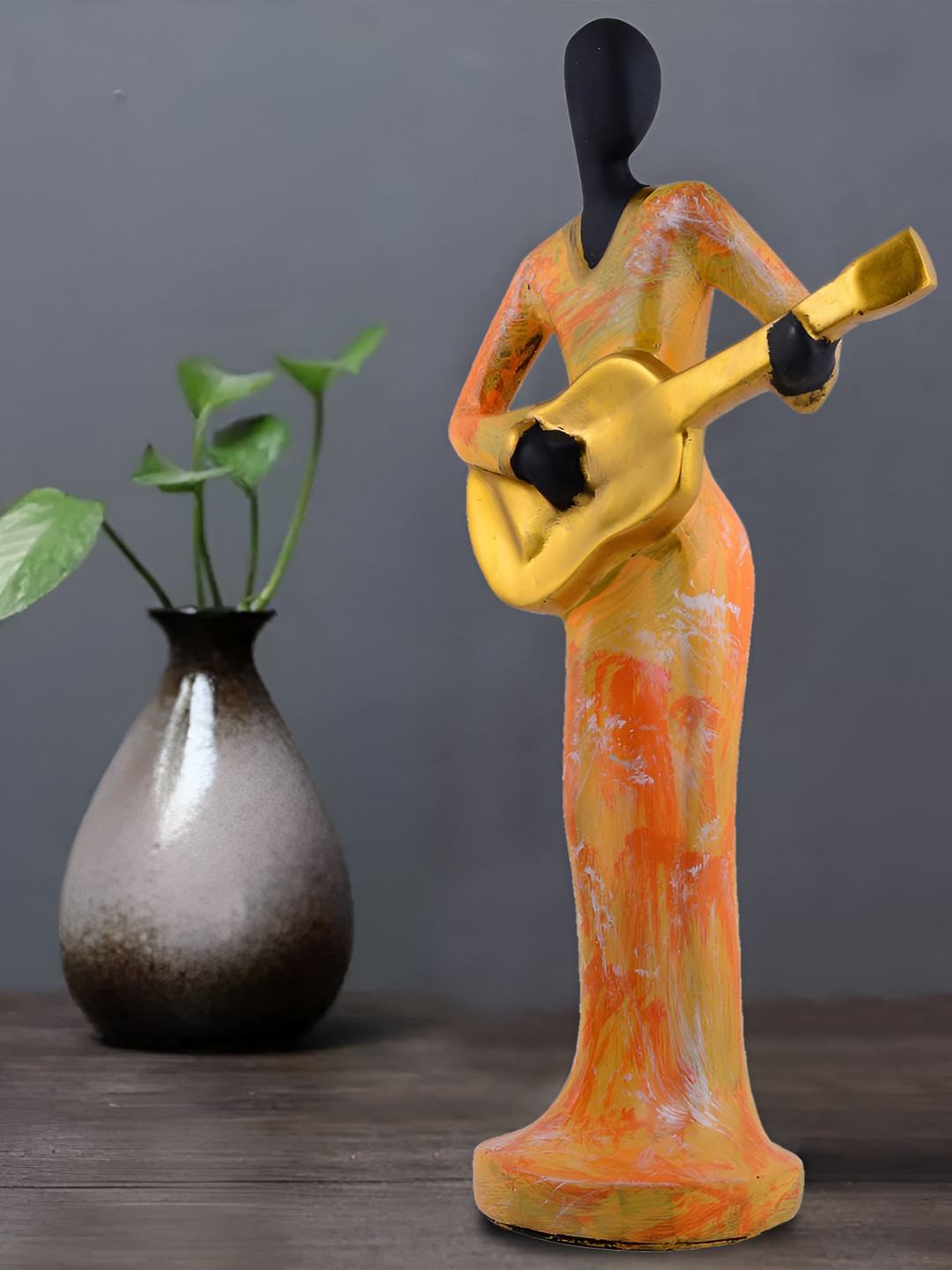 Zart Orange Polyresin Glossy Living Room Medium Showpiece - 3.9 Inches