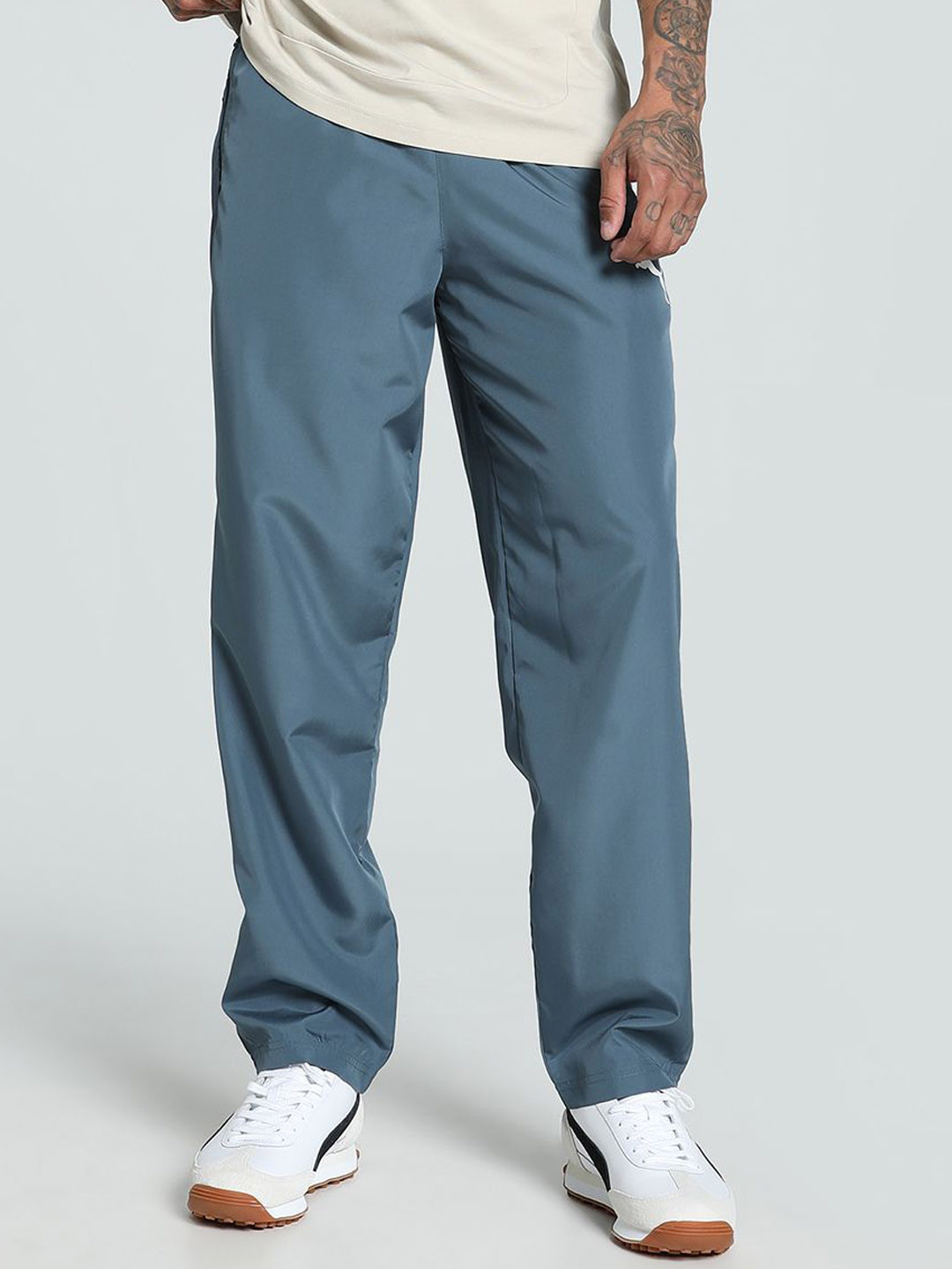Puma Men's Regular Fit Zippered Woven Pants