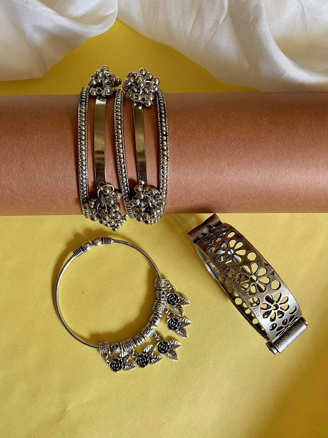 ATIBELLE Set Of 11 Silver Plated & Round Shaped -Textured Bangles