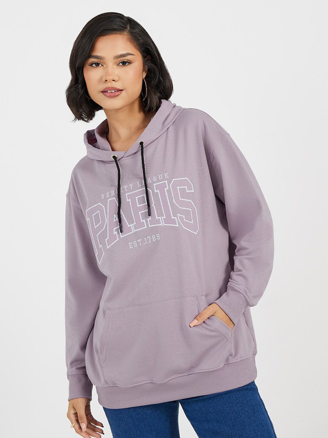 Styli Women Regular Fit Longline Embroidered Slogan Pullover Hoodie with Kangaroo Pocket