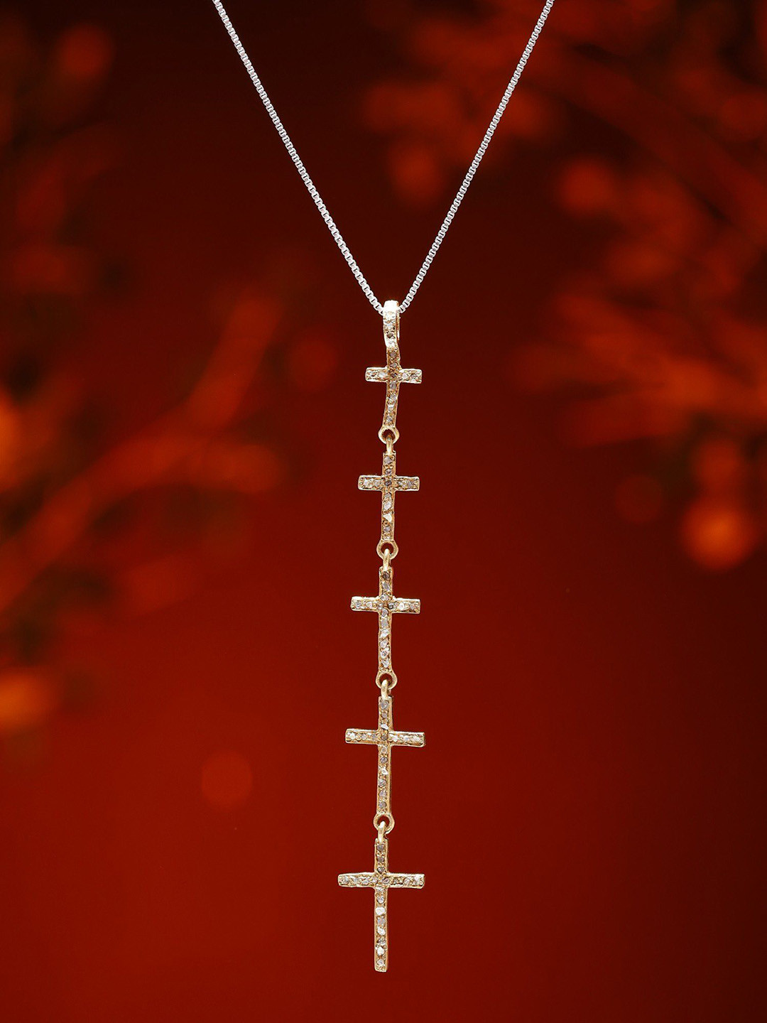 Exotic India Gold Plated Sterling Silver Cross Pendant with Diamond